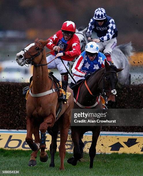 Jamie Moore riding Sire De Grugy clear the last to win The Betfair Tingle Creek Steeple Chase from Special Tiara at Sandown racecourse on December...