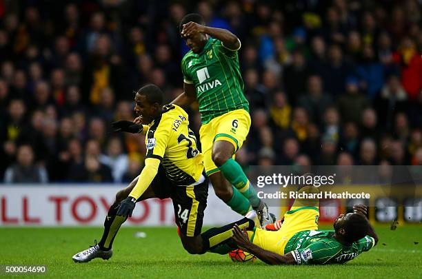 Odion Ighalo of Watford is brought down by Alexander Tettey of Norwich City resulting in a penalty kick during the Barclays Premier League match...