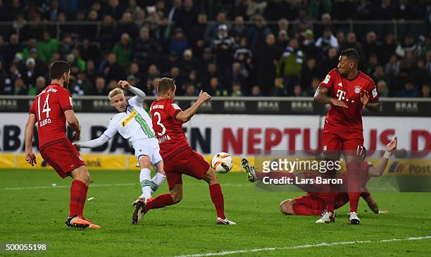 Oscar Wendt of Moenchengladbach scores his teams first goal during the Bundesliga match between Borussia Moenchengladbach and FC Bayern Muenchen at...