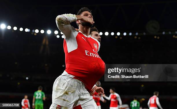 Olivier Giroud of Arsenal celebrates scoring his team's second goal during the Barclays Premier League match between Arsenal and Sunderland at...