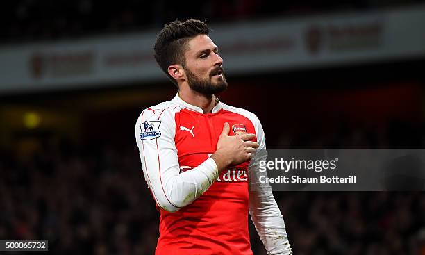 Olivier Giroud of Arsenal celebrates scoring his team's second goal during the Barclays Premier League match between Arsenal and Sunderland at...