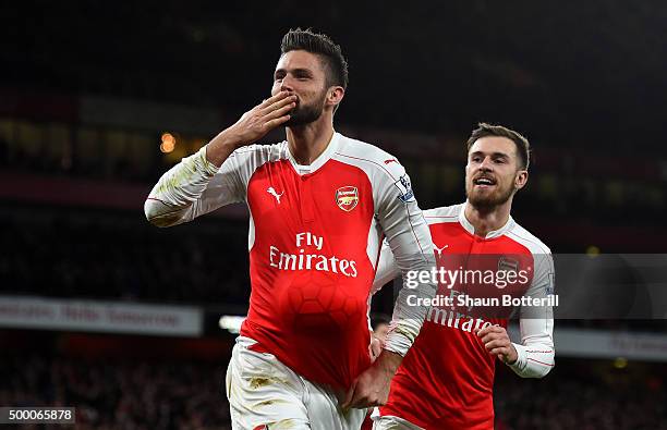Olivier Giroud of Arsenal celebrates scoring his team's second goal with his team mate Aaron Ramsey during the Barclays Premier League match between...