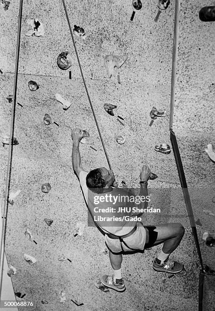 Michael Rubens Bloomberg, candid shot, Bloomberg is climbing a climbing wall, ca 47 years of age, 1997. .