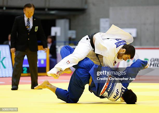 Avtandil Tchrikishvili of Georgia and Keita Nagashima of Japan compete in the Men's 81kg preliminary at Tokyo Metropolitan Gymnasium on December 5,...