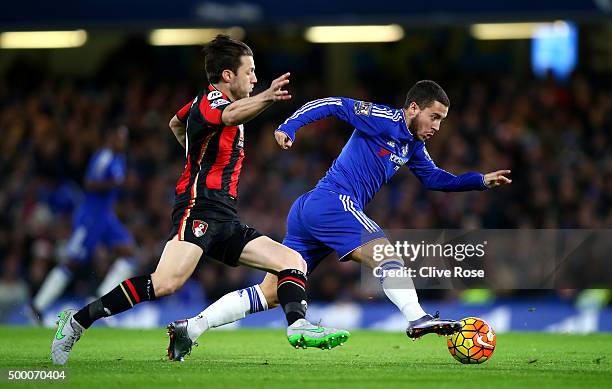 Eden Hazard of Chelsea and Harry Arter of Bournemouth compete for the ball during the Barclays Premier League match between Chelsea and A.F.C....