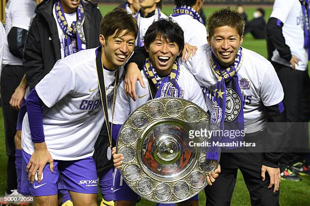 Kazuyuki Morisaki ,Koji Morisaki and Hisato Sato of Sanfrecce Hiroshima hold the schale. Sanfrecce Hiroshima won the J.League 2015. After the...