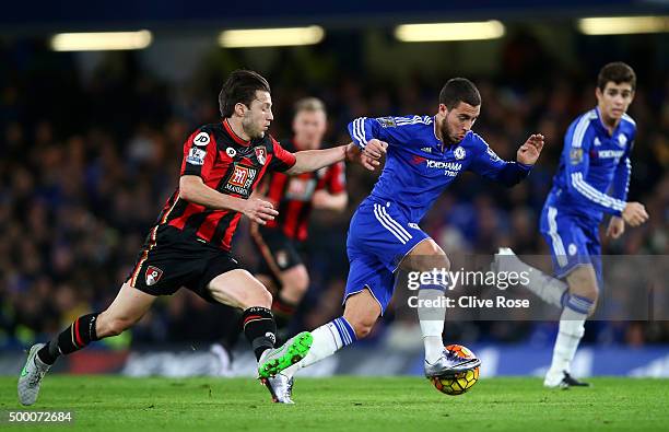 Eden Hazard of Chelsea and Harry Arter of Bournemouth compete for the ball during the Barclays Premier League match between Chelsea and A.F.C....