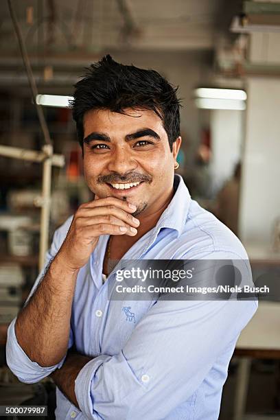portrait of sewing factory owner, thamel, kathmandu, nepal - nepal culture stock pictures, royalty-free photos & images