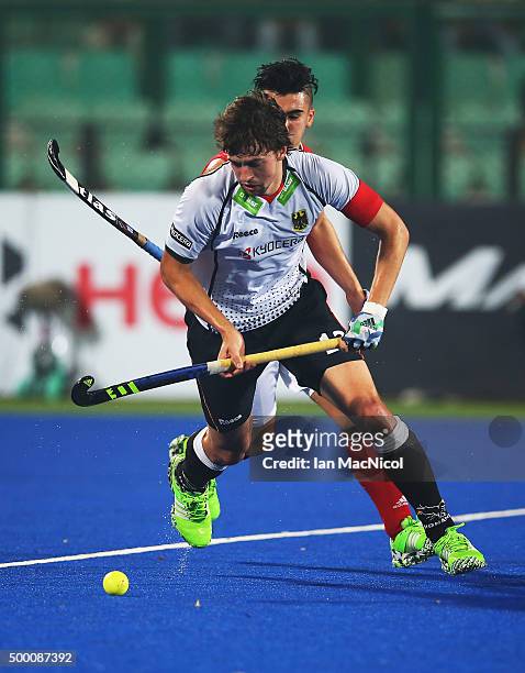 Devohn Noronha Teixeira of Canada vies with Tobias Hauke Captain of Germany during the match between Germany and Canada on day nine of The Hero...
