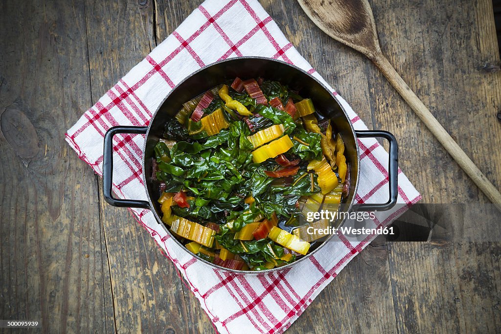 Cooked red and yellow mangold in a pot