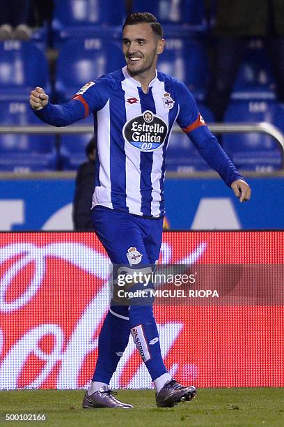 Deportivo La Coruna's midfielder Lucas Perez celebrates after scoring a goal during the Spanish league football match RC Deportivo de la Coruna vs...