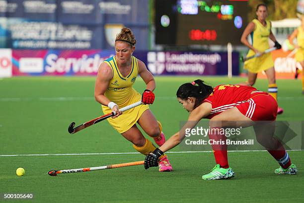 Georgia Nanscawen of Australia evades Qiuxia Cui of China during the Pool B match between Australia and China on day one of the Hockey World League...