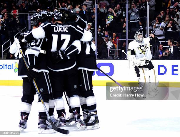 Marc-Andre Fleury of the Pittsburgh Penguins reacts after a goal from Milan Lucic of the Los Angeles Kings to trail 3-0 during the second period at...