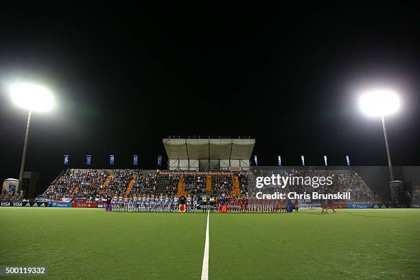 Argentina and Great Britain line up for the national anthems during Day 1 of the Hockey World League Final Rosario 2015 at El Estadio Mundialista on...