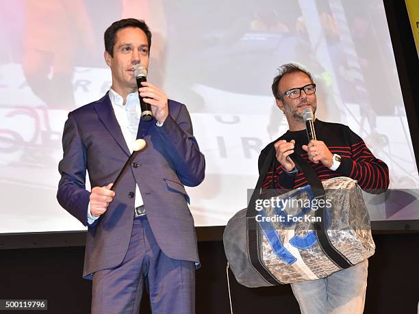 Auctioneer Vincent Sarrou from Etude Tessier et Sarrou and actor Pierre Franois Martin Laval attend the '727 Sailbags' Auction in Benefit to 'Les...