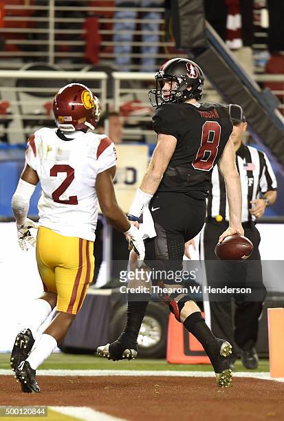 Kevin Hogan of the Stanford Cardinal scores a touchdown in front of Adoree' Jackson of the USC Trojans during the second quarter of the NCAA Pac-12...