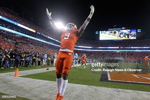 Clemson's Wayne Gallman celebrates a 16-yard touchdown reception during the first half against North Carolina in the ACC Football Championship at...