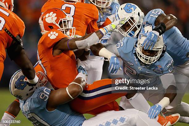 Nazair Jones of the North Carolina Tar Heels tackles Wayne Gallman of the Clemson Tigers in the 1st quarter during the Atlantic Coast Conference...