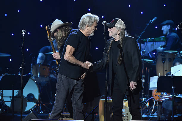 Kris Kristofferson, Chris Stapleton and Willie Nelson perform on stage during the Imagine: John Lennon 75th Birthday Concert at The Theater at...