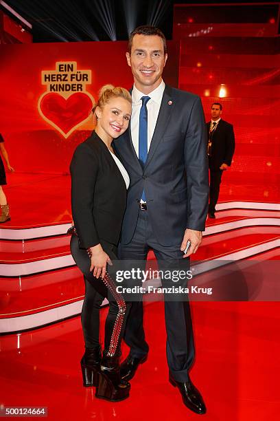 Hayden Panettier and Wladimir Klitschko attend the Ein Herz Fuer Kinder Gala 2015 show at Tempelhof Airport on December 5, 2015 in Berlin, Germany.