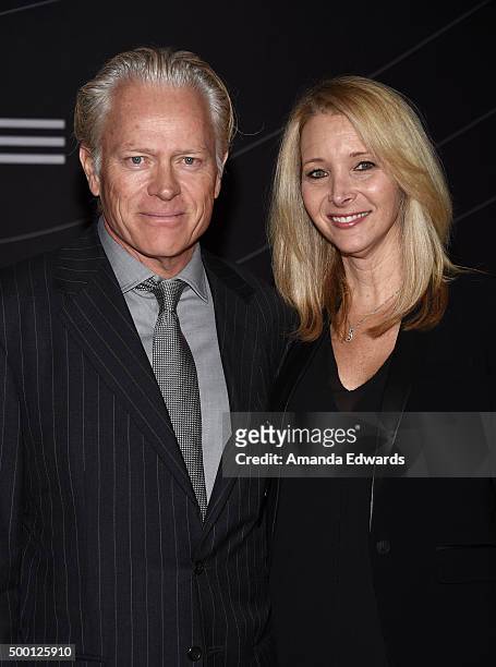 Actress Lisa Kudrow and her husband Michel Stern arrive at the Petersen Automotive Museum Grand Re-Opening at the Petersen Automotive Museum on...