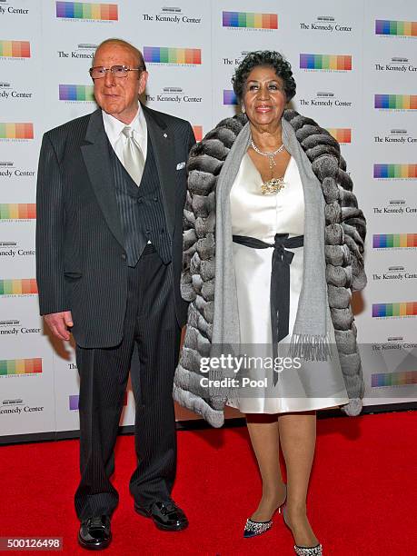 Clive Davis and Aretha Franklin arrive for the formal Artist's Dinner honoring the recipients of the 38th Annual Kennedy Center Honors hosted by...