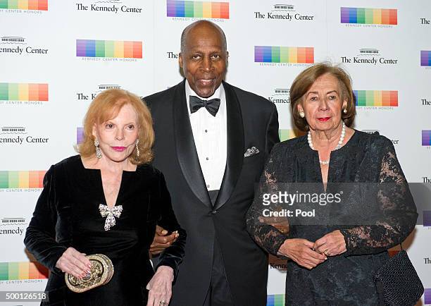 Buffy Cafritz, Vernon Jordan, and Ann Jordan arrive for the formal Artist's Dinner honoring the recipients of the 38th Annual Kennedy Center Honors...