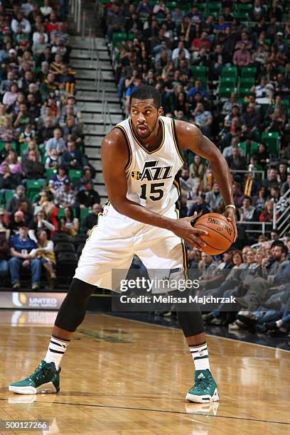 Derrick Favors of the Utah Jazz defends the ball against the Indiana Pacers during the game on December 5, 2015 at Vivint Smart Home Arena in Salt...