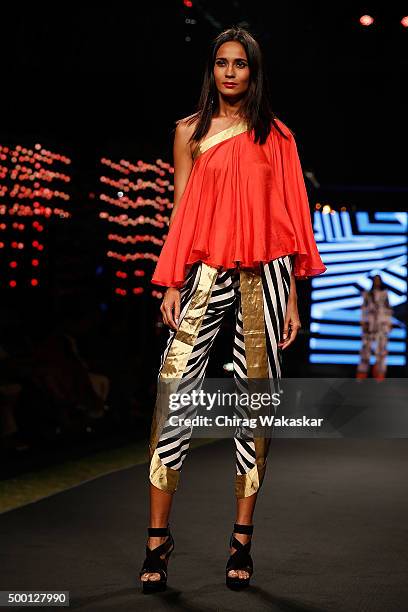 Model walks the runway at the Masaba Gupta show during day 2 of Blenders Pride Fashion Tour held at the Grand Hyatt on December 5, 2015 in Mumbai,...