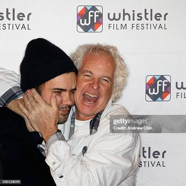 Executive Vice President of Cineplex Filmed Entertainment Michael Kennedy embraces Actor Rossif Sutherland on the red carpet before the Borsos...