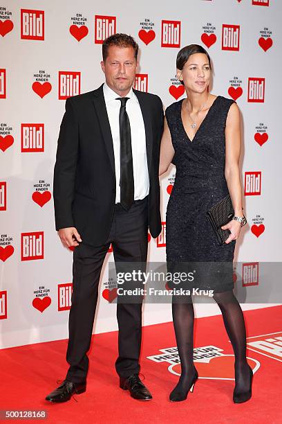 Til Schweiger and Marlene Shirley attend the Ein Herz Fuer Kinder Gala 2015 at Tempelhof Airport on December 5, 2015 in Berlin, Germany.