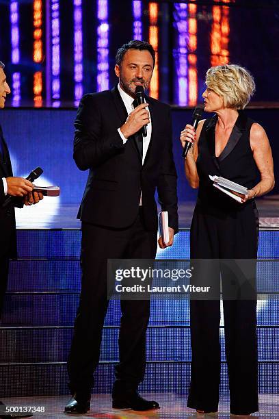 Presenters Frederic Lopez and Sophie Davant attend the 'France Television Telethon 2015'Marc Lavoine at Hippodrome de Longchamp on December 5, 2015...