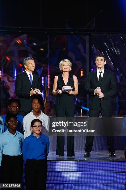 Nagui, Sophie Davant and Marc Lavoine attend the 'France Television Telethon 2015'Marc Lavoine at Hippodrome de Longchamp on December 5, 2015 in...