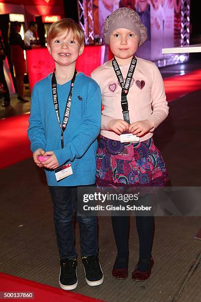 Sontje and her brother Tizian attend the Ein Herz Fuer Kinder Gala 2015 reception at Tempelhof Airport on December 5, 2015 in Berlin, Germany.