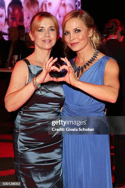 Tina Ruland and Regina Halmich attend the Ein Herz Fuer Kinder Gala 2015 reception at Tempelhof Airport on December 5, 2015 in Berlin, Germany.