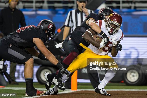 Running back Ronald Jones II of the USC Trojans scores a touchdown against the Stanford Cardinal during the third quarter of the Pac-12 Championship...