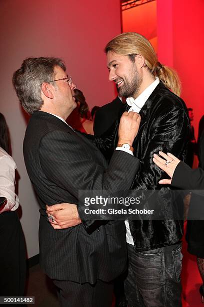 Peter Schwenkow and David Garrett attend the Ein Herz Fuer Kinder Gala 2015 reception at Tempelhof Airport on December 5, 2015 in Berlin, Germany.