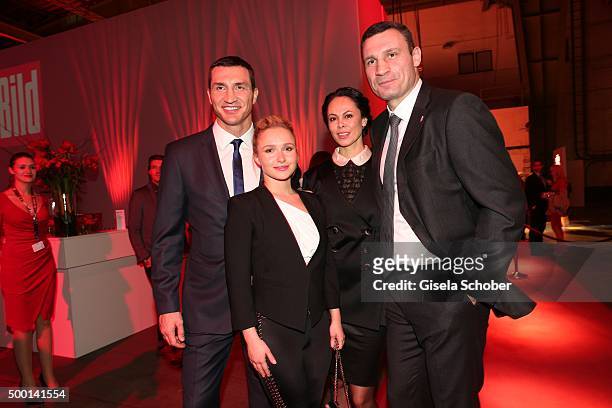 Wladimir Klitschko, Hayden Panettiere, Natalia Klitschko and Vitali Klitschko attends the Ein Herz Fuer Kinder Gala 2015 reception at Tempelhof...