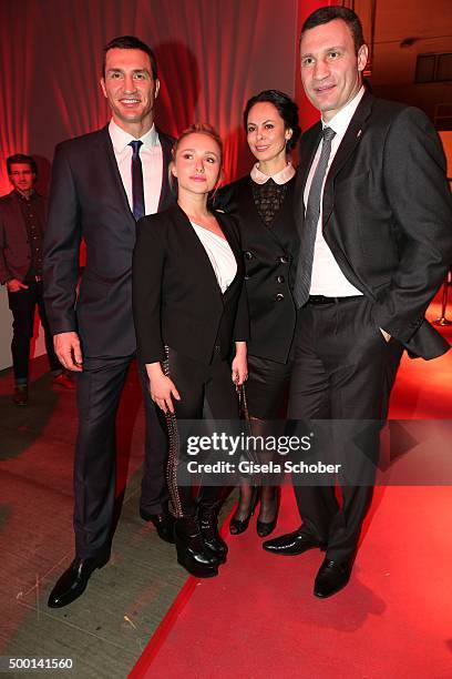 Wladimir Klitschko, Hayden Panettiere, Natalia Klitschko and Vitali Klitschko attends the Ein Herz Fuer Kinder Gala 2015 reception at Tempelhof...