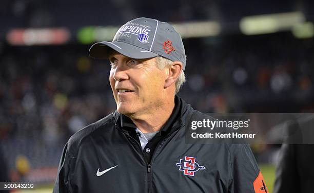 Head coach Rocky Long of the San Diego State Aztecs wears the champion's hat after winning the Mountain West Championship game against the Air Force...