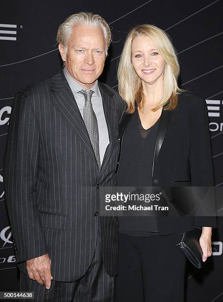 Lisa Kudrow and Michel Stern arrive at the Petersen Automotive Museum grand re-opening gala held on December 5, 2015 in Los Angeles, California.