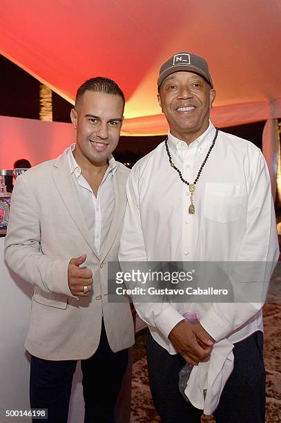 Kevin Vanegas and Russell Simmons attend SHOP.com celebration of art with Phillipe Hoerle-Guggenheim presenting RETNA, hosted by JR & Loren Ridinger,...