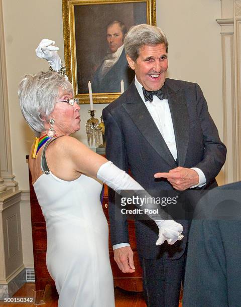 United States Secretary of State John F. Kerry and singer Rita Moreno, one of the five recipients of the 38th Annual Kennedy Center Honors, share a...