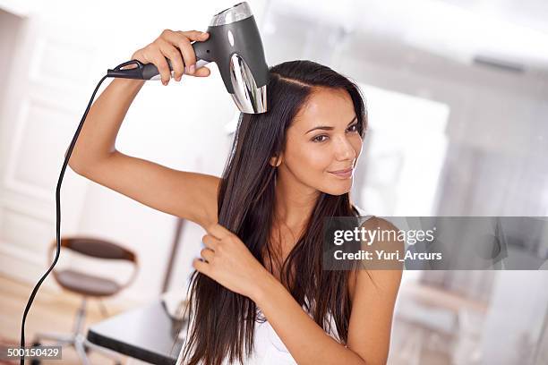 keeping those locks in check - hair dryer stock pictures, royalty-free photos & images