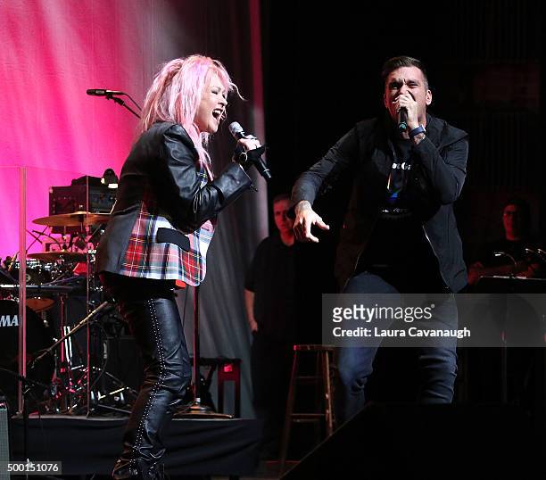 Cyndi Lauper and Jordan Pundik perform at the 5th Annual "Cyndi Lauper And Friends: Home For The Holidays" Benefit Concert at The Beacon Theatre on...
