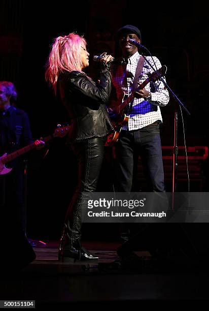 Keb' Mo' and Cyndi Lauper perform at the 5th Annual "Cyndi Lauper And Friends: Home For The Holidays" Benefit Concert at The Beacon Theatre on...