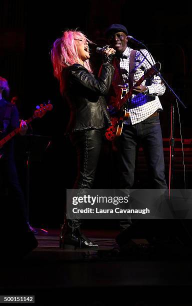 Keb' Mo' and Cyndi Lauper perform at the 5th Annual "Cyndi Lauper And Friends: Home For The Holidays" Benefit Concert at The Beacon Theatre on...