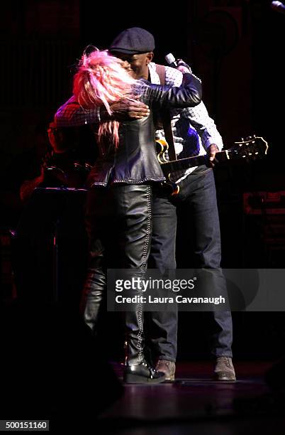Keb' Mo' and Cyndi Lauper perform at the 5th Annual "Cyndi Lauper And Friends: Home For The Holidays" Benefit Concert at The Beacon Theatre on...
