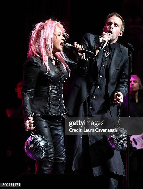 Cyndi Lauper and Justin Tranter perform at the 5th Annual "Cyndi Lauper And Friends: Home For The Holidays" Benefit Concert at The Beacon Theatre on...