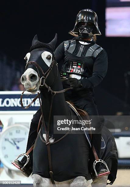 Penelope Leprevost of France rides as Darth Vader during the 'Style and Competition' show jumping charity event benefitting 'AMADE' on day three of...
